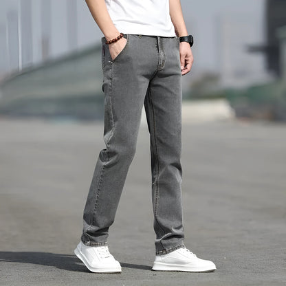 Men's smoky gray straight leg jeans with high elasticity fabric and low waist design