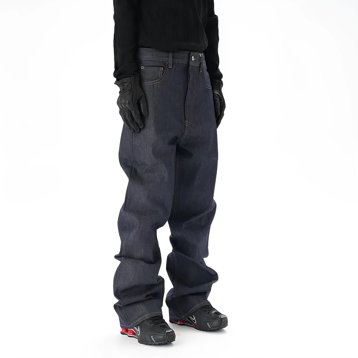 Men's dark blue loose straight-leg denim jeans laid flat, showing front view.