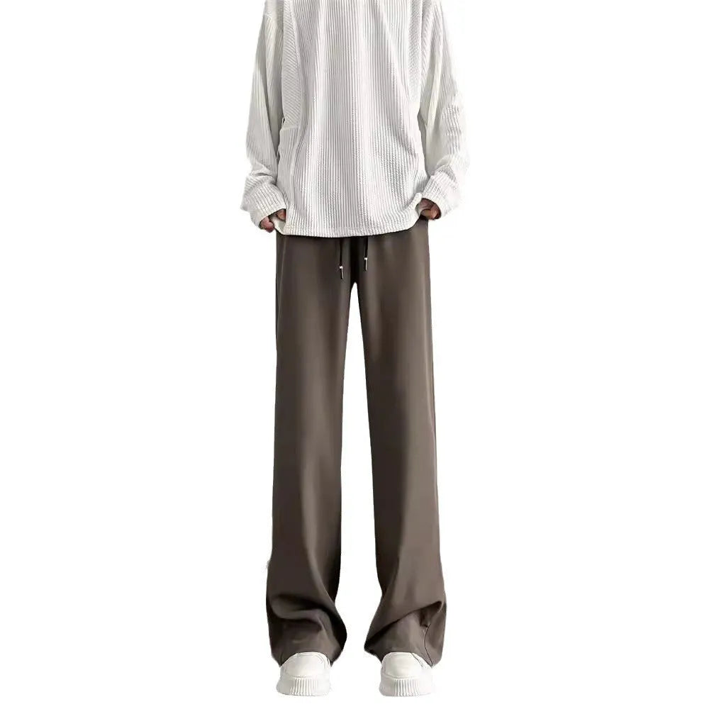 Men's straight leg casual trousers in black or brown, polyester blend, drawstring mid waist, sizes M-XXL