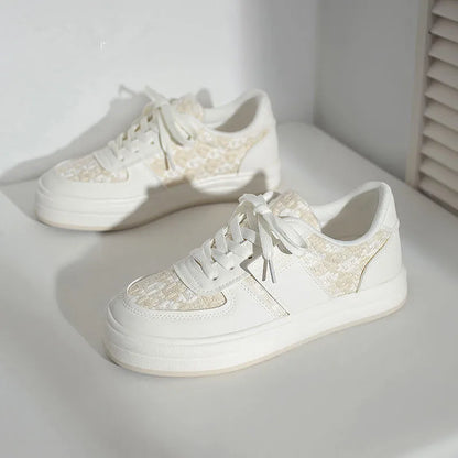 Beige and plaid patterned platform sports shoes with round toe and white rubber sole.