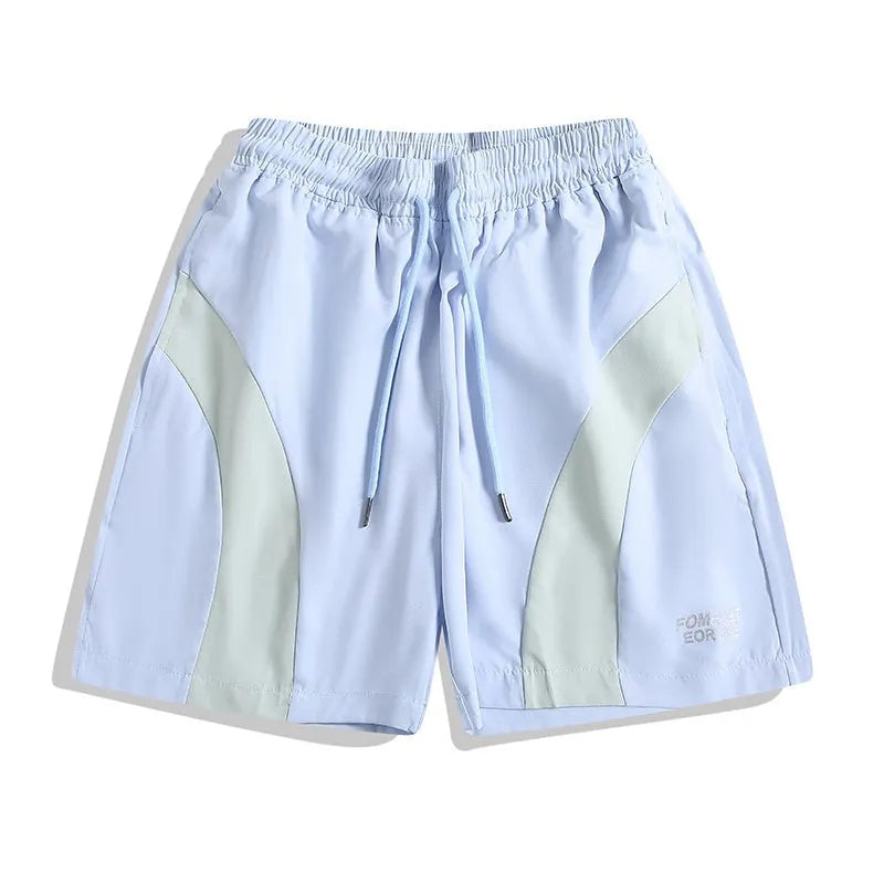 Loose-fit black sports shorts with elastic waistband and straight-leg cut for athletic wear