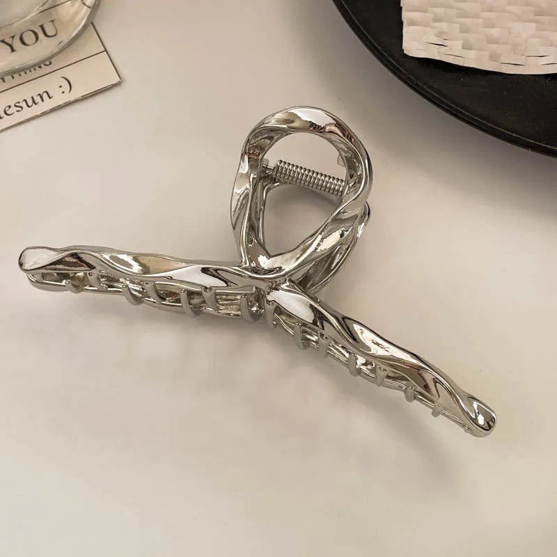 Silver metal hair claw barrette example from a range of 44 Korean-style designs.