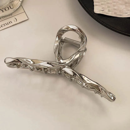 Silver metal hair claw barrette example from a range of 44 Korean-style designs.