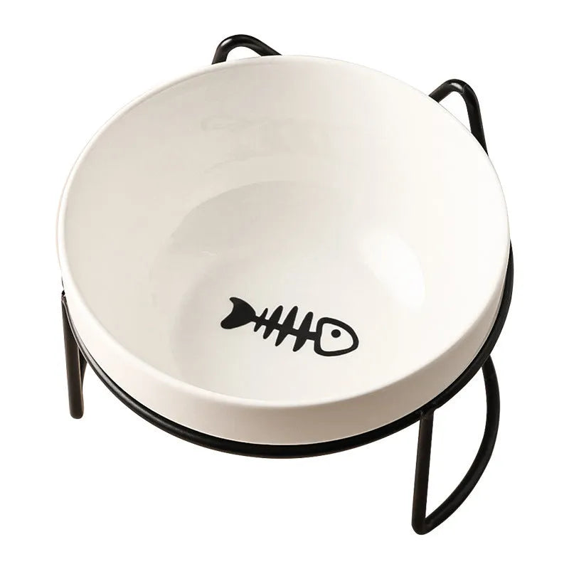 White ceramic pet bowl with cat paw print in a black iron stand with cat ear details