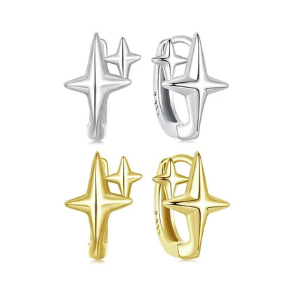Sterling silver minimalist star ear clip with oxidised finish and XINGX design detail.