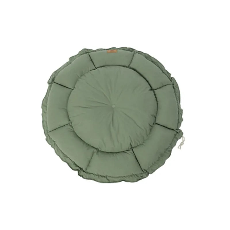 Reversible circular donut cat bed in grey and green colours showing raised outer rim