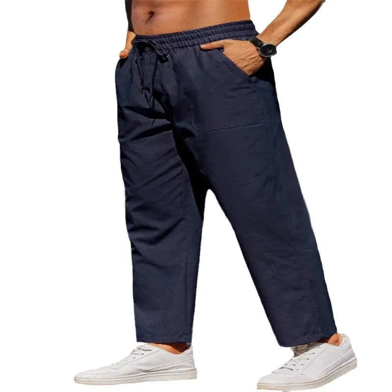 Men's linen straight-leg trousers with elastic waist in solid colours including white, black, green, dark brown, khaki, apricot and navy blue, available in sizes S to XXXL for casual outdoor and daily wear