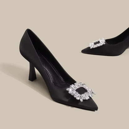 Women's pointed toe stiletto high heels in beige and black colours with low top design