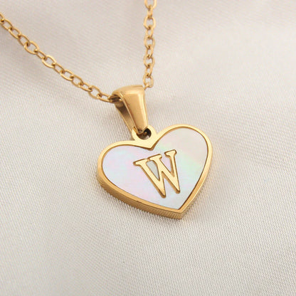 Personalized heart-shaped white shell necklace with adjustable clavicle chain, a stylish and versatile jewelry piece for women