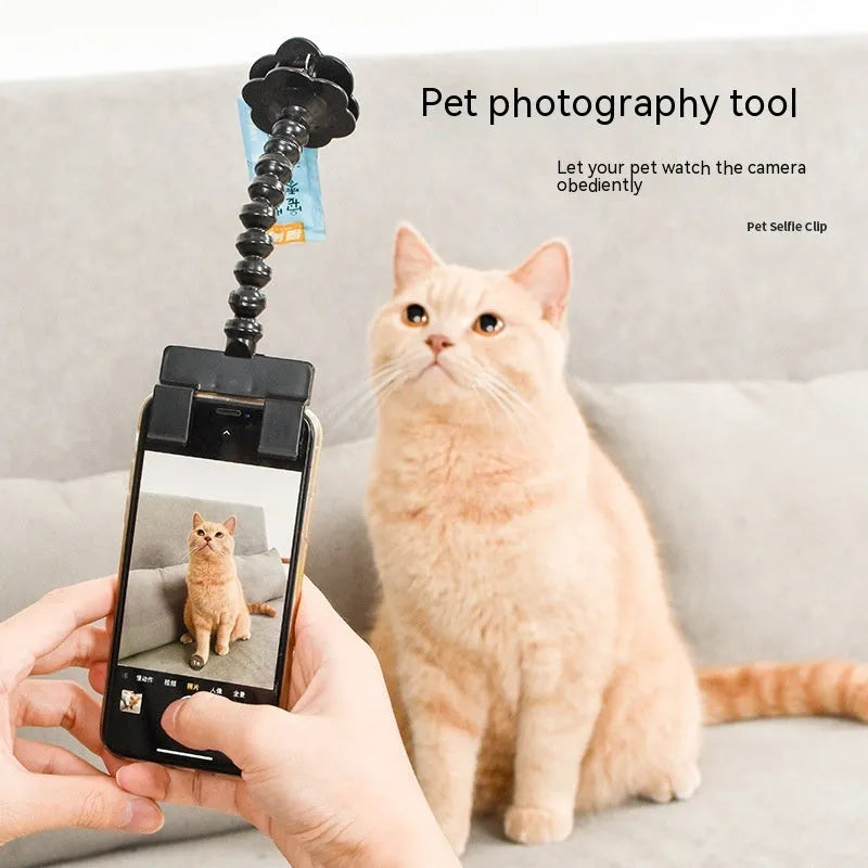 Black pet photography tool with rotating clip and phone holder for attracting pet attention during photos