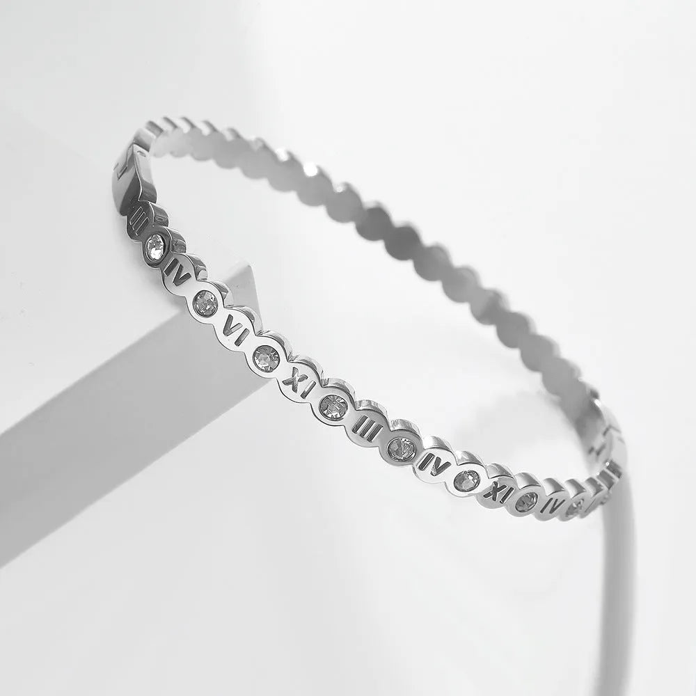 Korean style titanium steel bracelet with a numerical design element on an adjustable band.