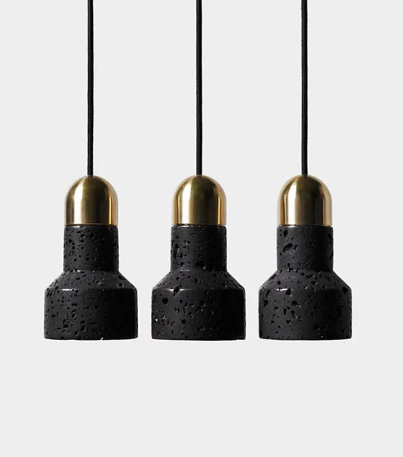Industrial style iron chandelier with an adjustable hanging cord above a dining table.