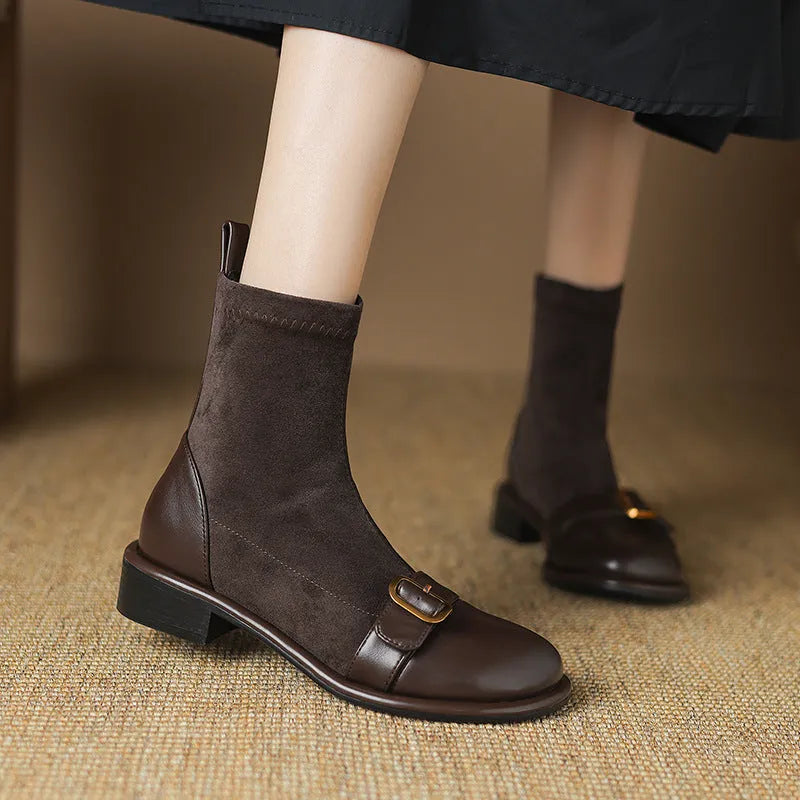 Women's black casual martin boots with low heel, lace-up front, and belt buckle stitching detail