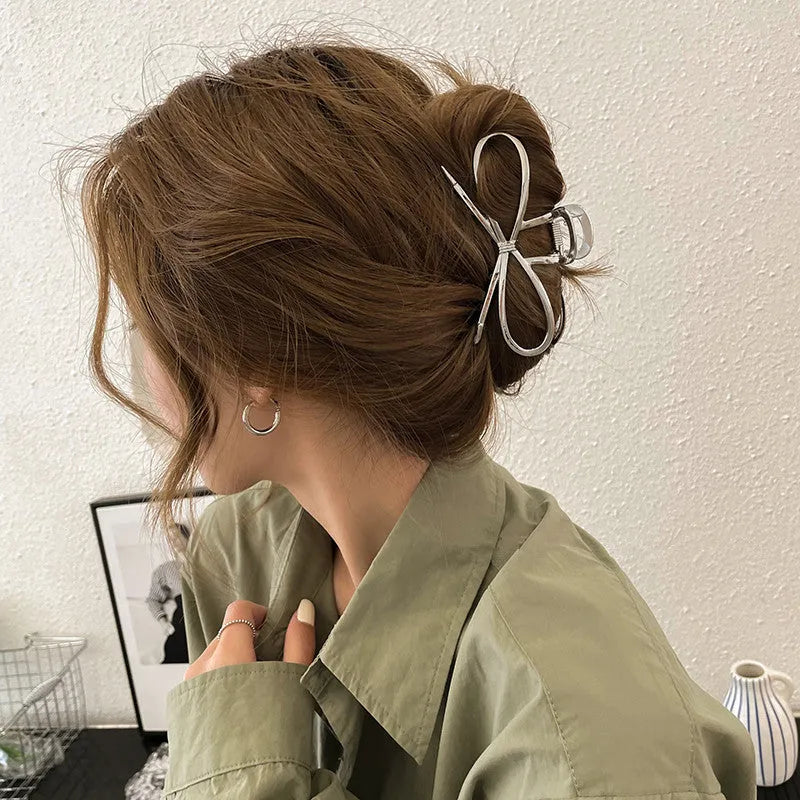 Alloy bow barrette hair grip in silver or gold colour for women's back-of-head styling