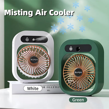 Green and white USB rechargeable misting fan humidifier with adjustable head on a desk