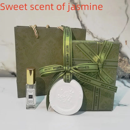 Car aromatherapy fragrant stone pendant with essential oil bottle on gift box