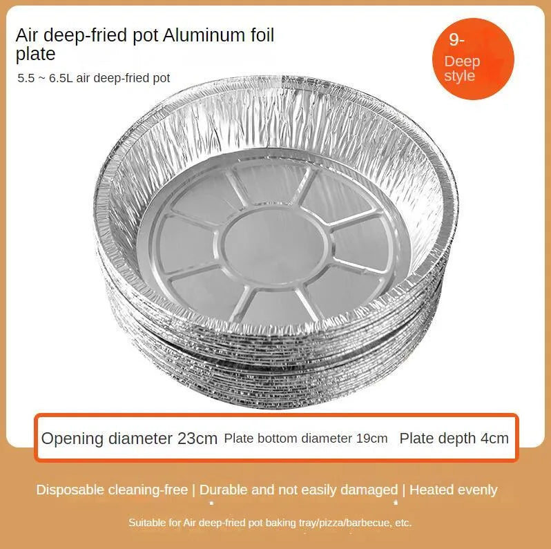 Round disposable aluminium foil liners for air fryers in four different sizes on a kitchen counter.