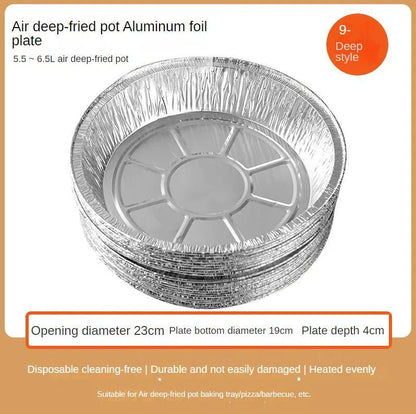 Round disposable aluminium foil liners for air fryers in four different sizes on a kitchen counter.