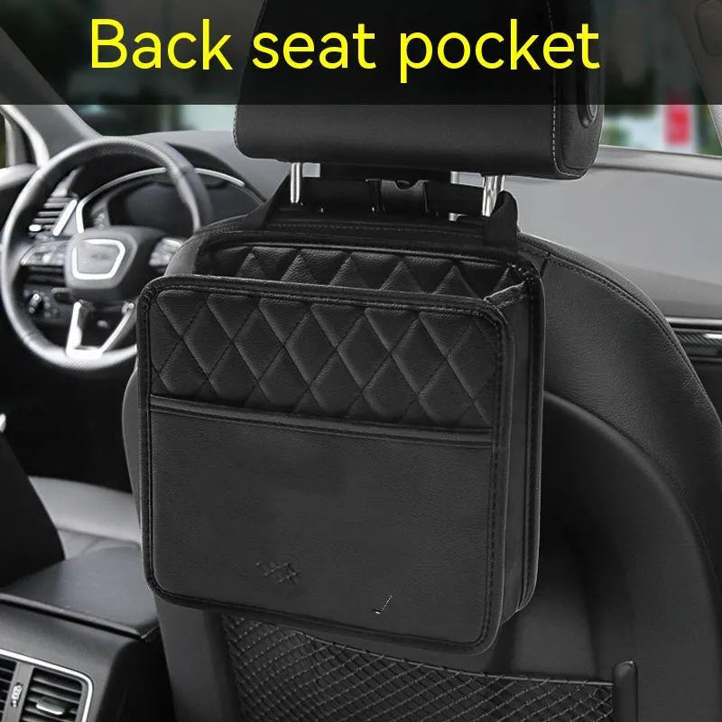 Black leather hanging storage bag for car interior organisation and trash.