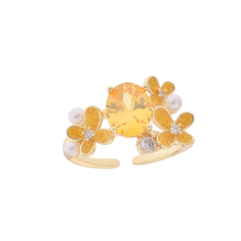 Women's adjustable open ring with flower and pearl design in yellow or light purple electroplated metal