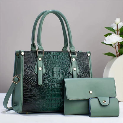 Contrast colour three-piece bag set showing bucket-shaped crossbody bag, wallet, and card holder in coordinated colours