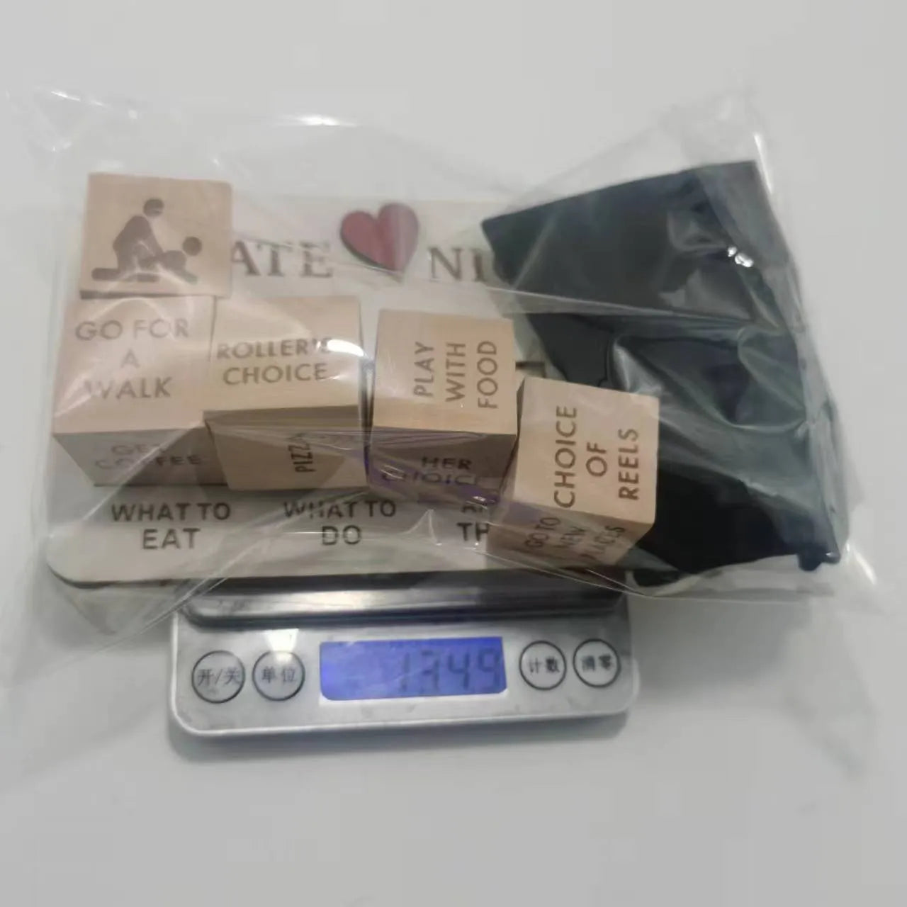 Wooden date night dice set with five 16x10cm dice, planner board, and black storage bag for couple activities