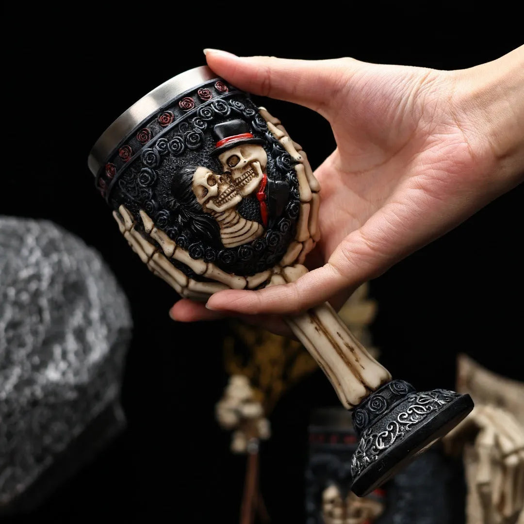 Red wine glass with stainless steel stem and detailed resin couple skeleton decoration, 200ml capacity