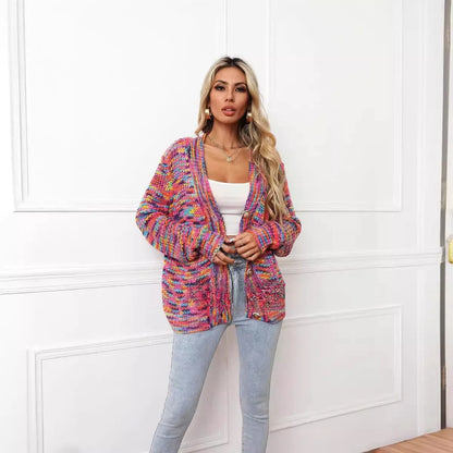 Rose Red rainbow dyed striped short cardigan knitted coat with loose fit on model.