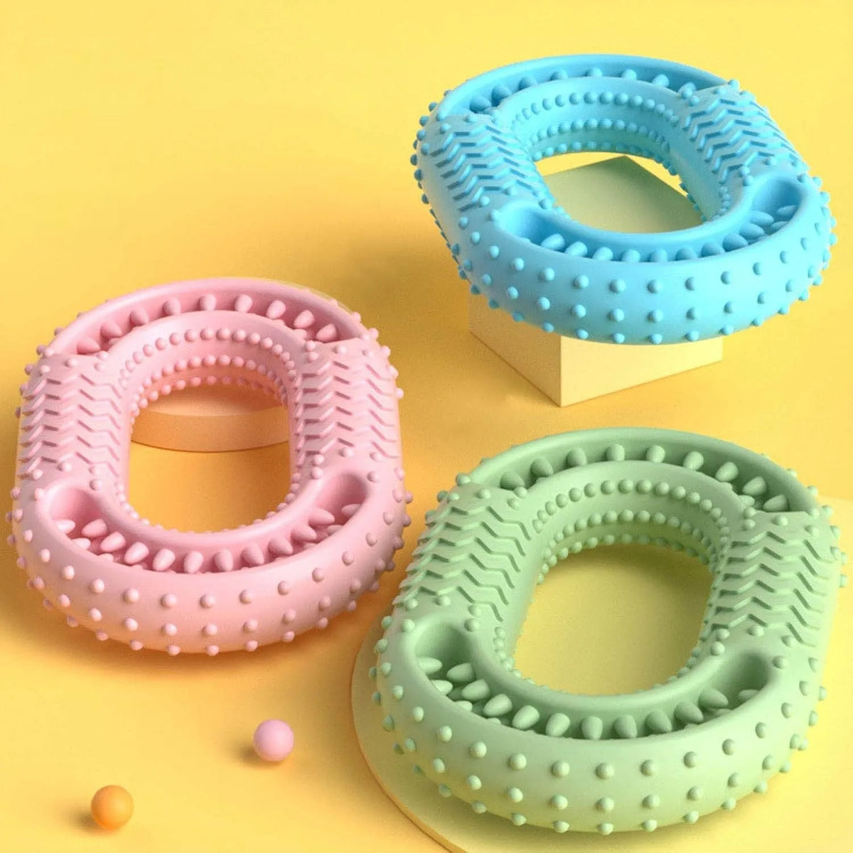 Blue O-ring shaped durable dog chew toy for aggressive chewers on a white background.