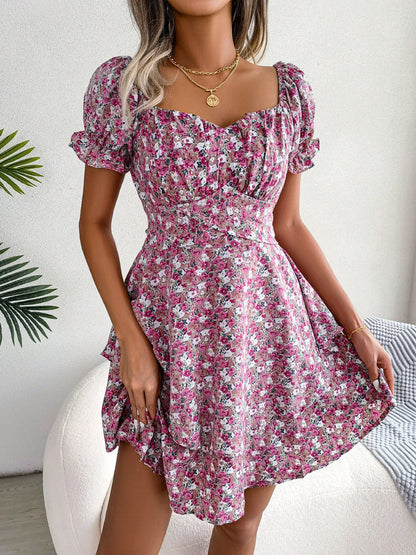 Stylish floral mini dress with ruffled skirt, high-waist design, and short sleeves for a flattering and comfortable summer look