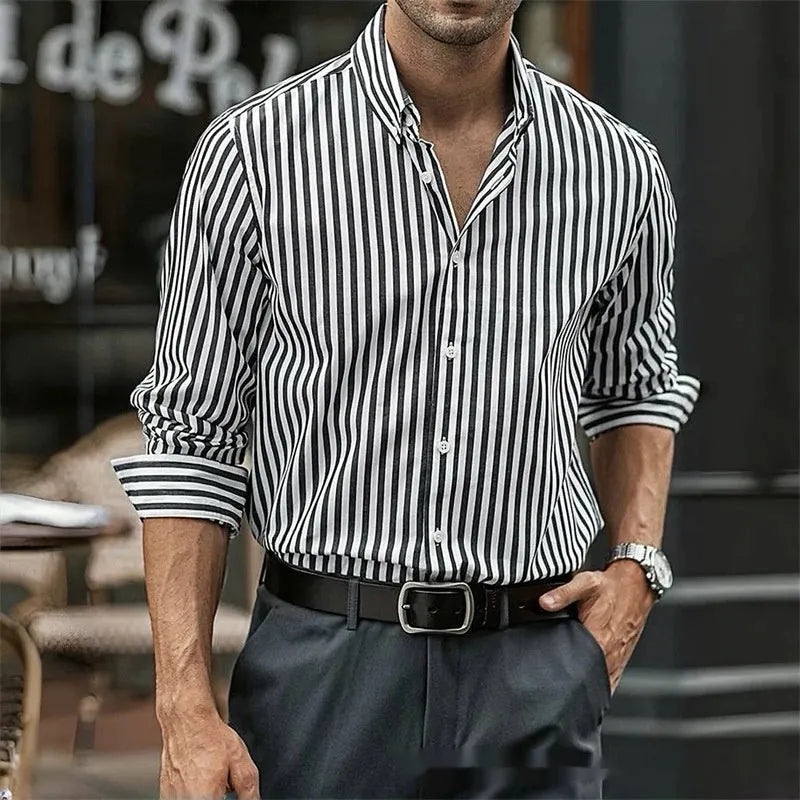 Man modelling a khaki and white striped loose-fit long sleeve casual button shirt.