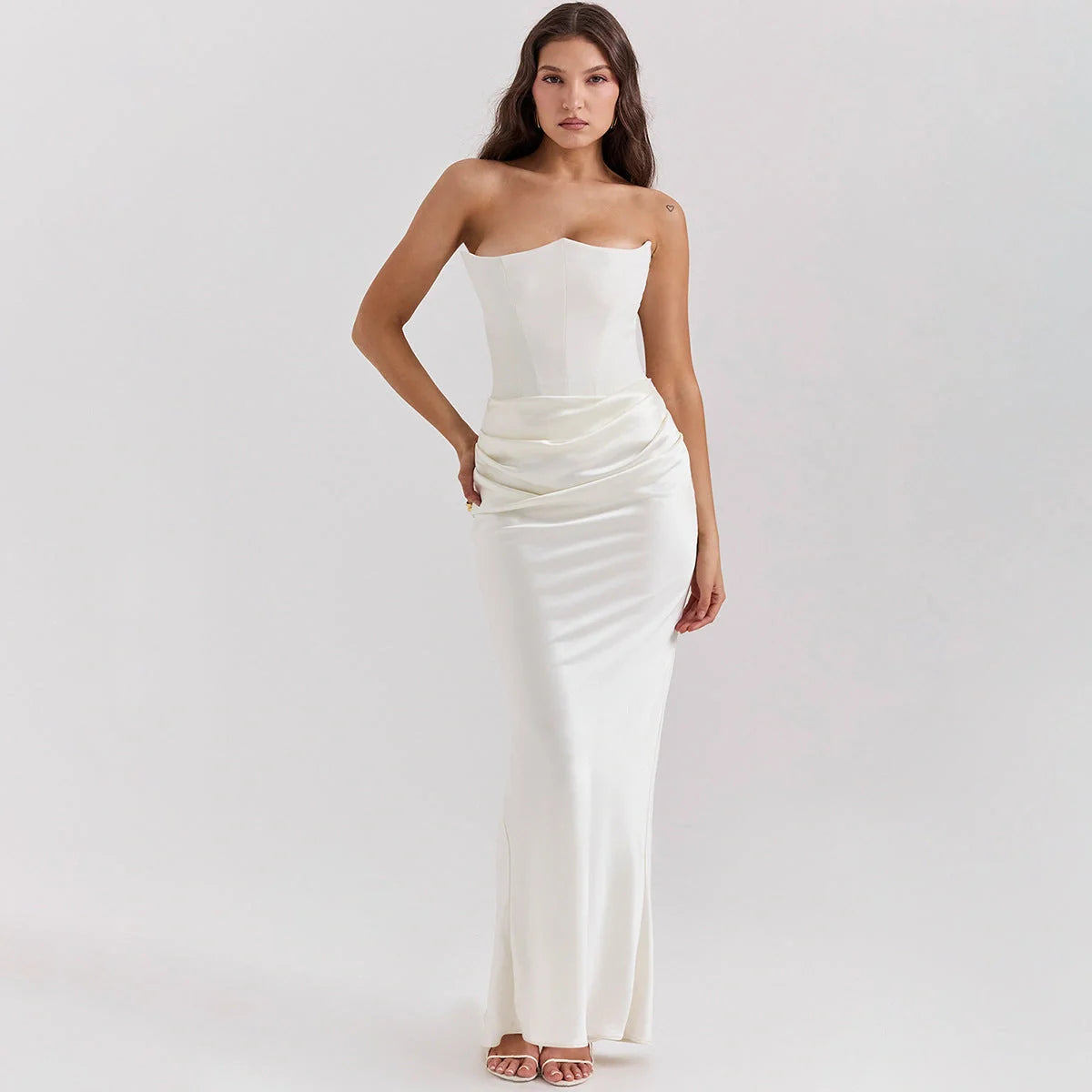 Elegant backless party dress in various colors and sizes, featuring a sleek and slender silhouette for the discerning UK fashionista