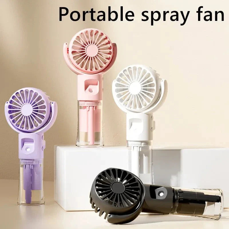 Compact handheld cooling mist fan with 4 adjustable wind speeds, perfect for staying cool and refreshed during the British summer