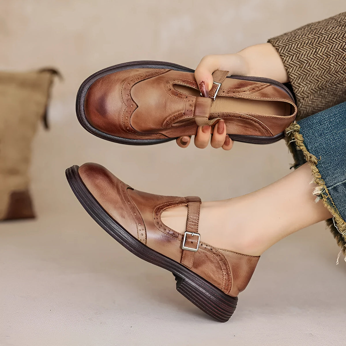 Women's black and brown round-toe flat casual shoes made from sheepskin leather.