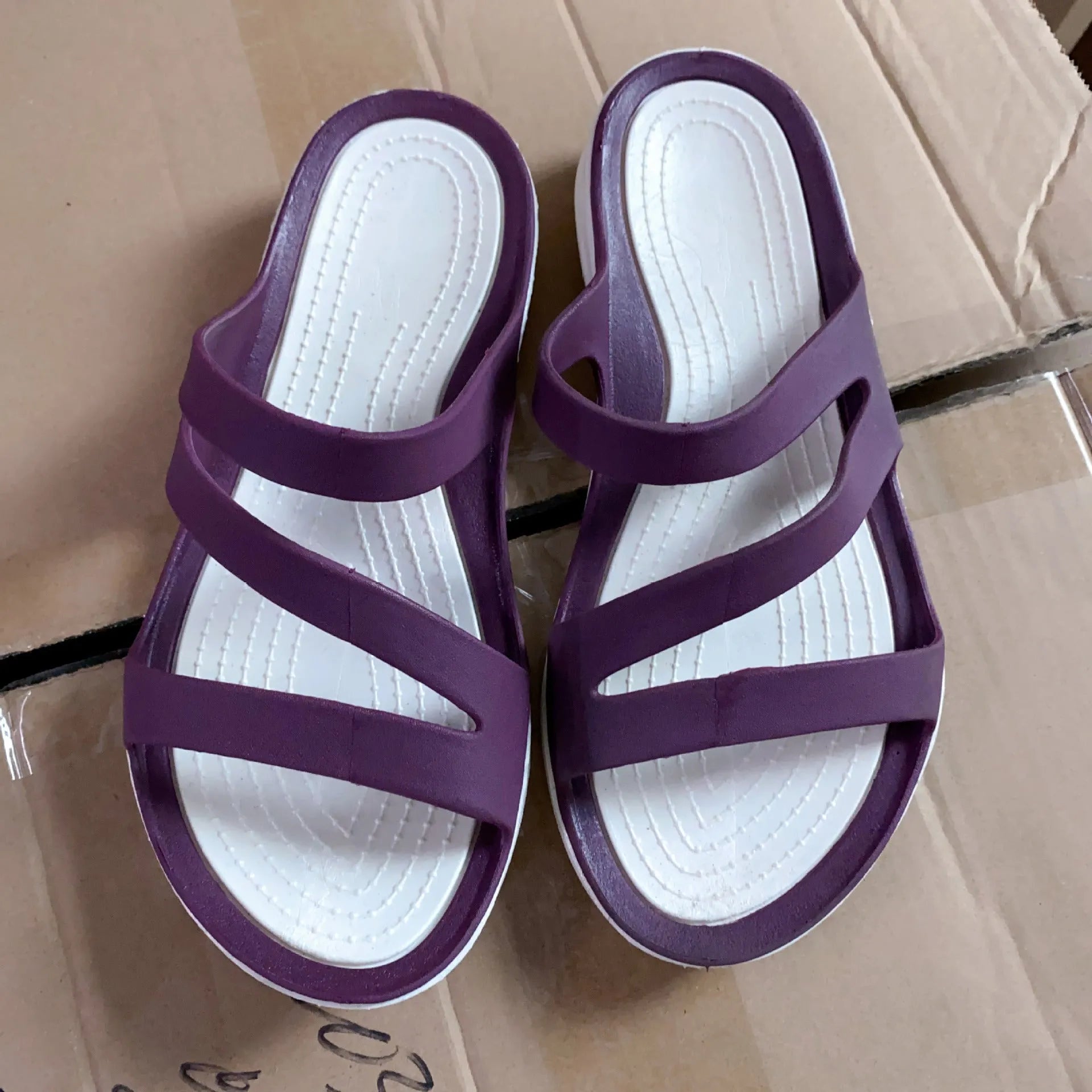 Women's solid colour breathable sandals in red, available in sizes 36 to 41.