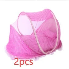 Breathable insect-free foldable baby travel cot with integrated mattress and pillow, available in blue, pink and blue-and-pink colour options