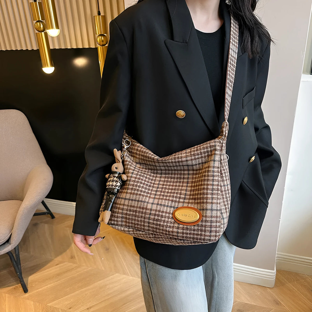 Women's large capacity woolen shoulder bag in brown with pendant attachment for autumn and winter use