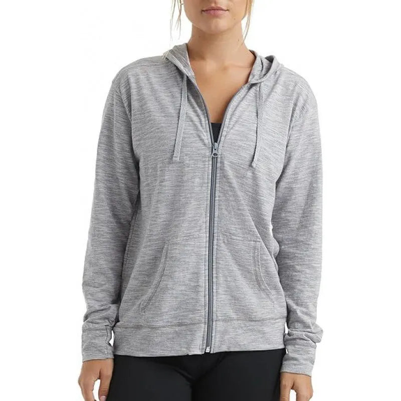 A loose fit solid colour hooded sweatshirt on a hanger, shown in one of six colour options.