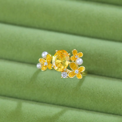 Women's adjustable open ring with flower and pearl design in yellow or light purple electroplated metal