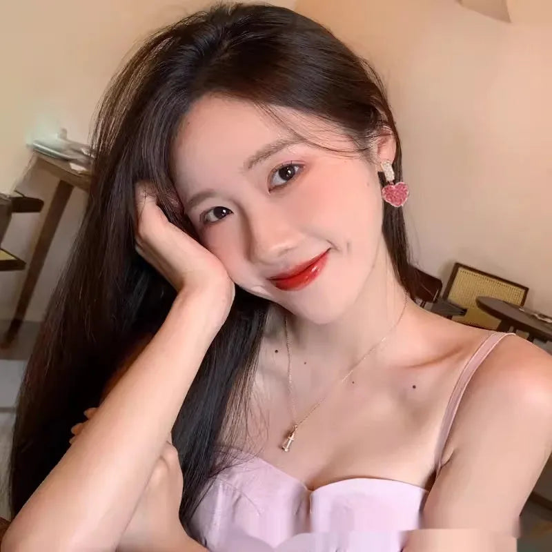 Blue and pink candy stud earrings with peach heart design in alloy material