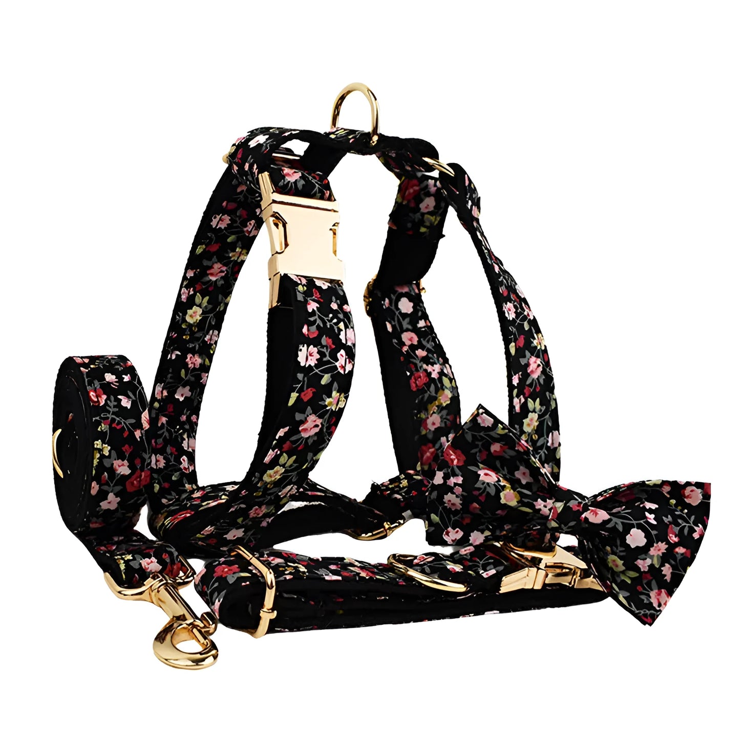 Four-piece dog accessory set showing a cloth collar, leash, vest, and removable bow with printed lettering.