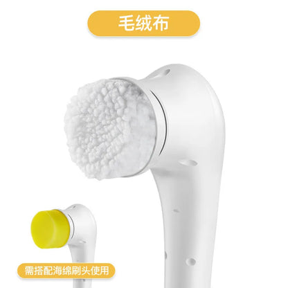 White cordless electric handheld scrubber with five attached brush heads on a kitchen counter