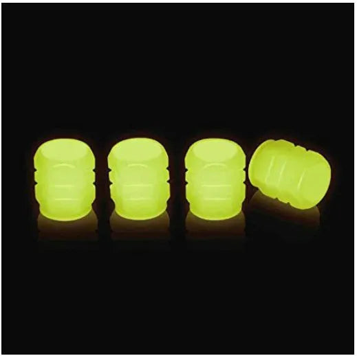 Glow-in-the-dark rubber tyre valve caps in five colour options on tyre valve stem