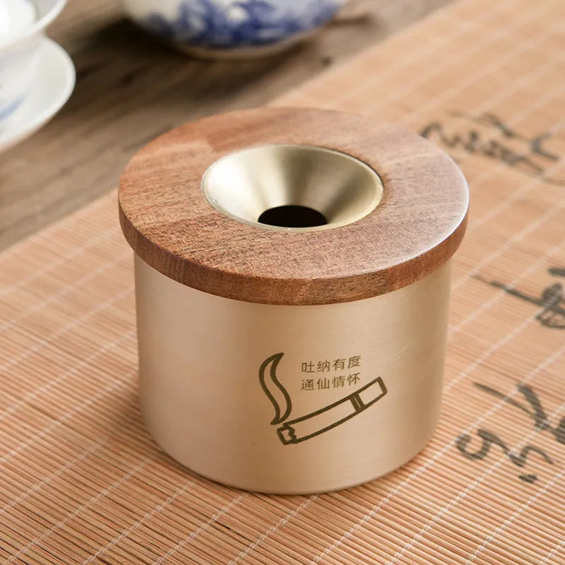Retro brass ashtray with wooden lid on copper base, showing 12cm diameter and central hole