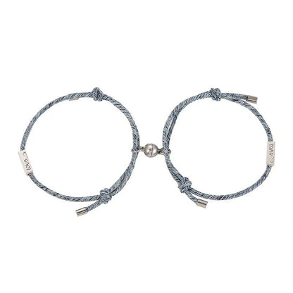 Magnetic couple's bracelet with geometric design and meaningful charms inspired by ancient Chinese tradition