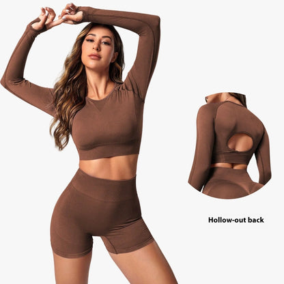 Women's high waist yoga suit in black colour showing long sleeve top and matching leggings