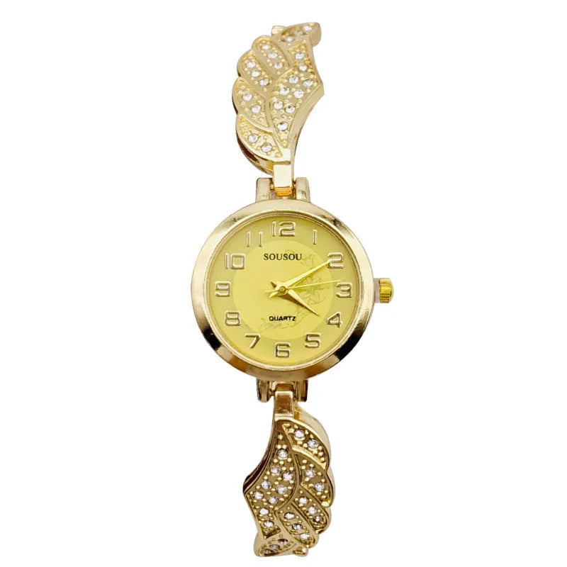 Stainless steel women's watch with round dial and vachette clasp on wrist.