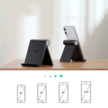 UGREEN LP106 adjustable lazy bracket phone holder in black, blue, or white, gripping a smartphone.