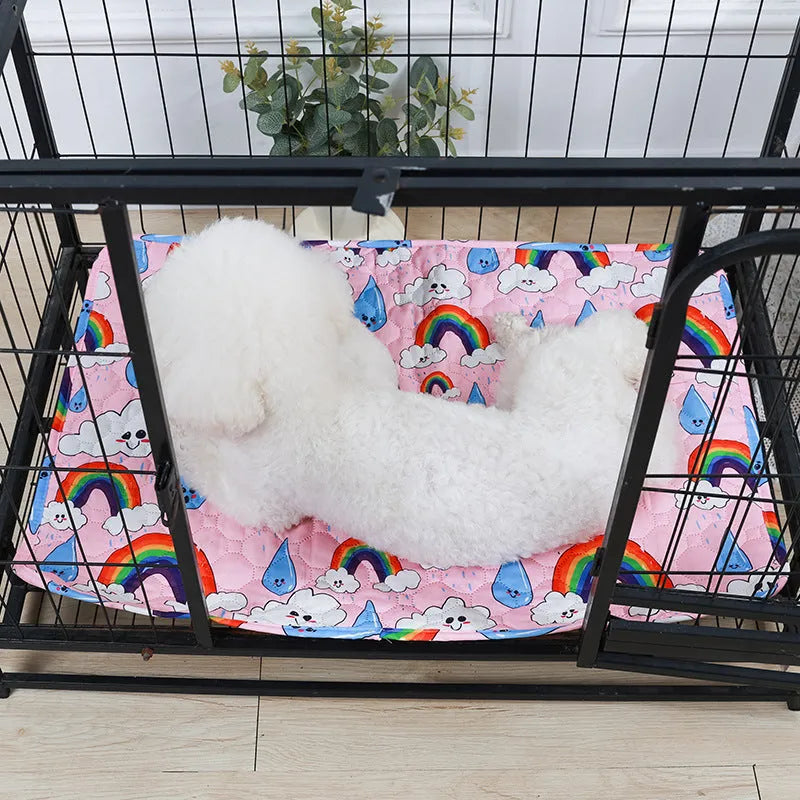 Reusable washable pet urine pad showing colourful animal pattern and waterproof backing.