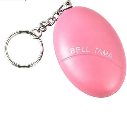 Compact black personal alarm keychain with pull-ring for loud siren activation, shown next to a ruler showing 6cm length.